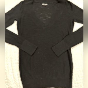 Express size S black deep V-neck very thin sweater with long sleeves cuffed.